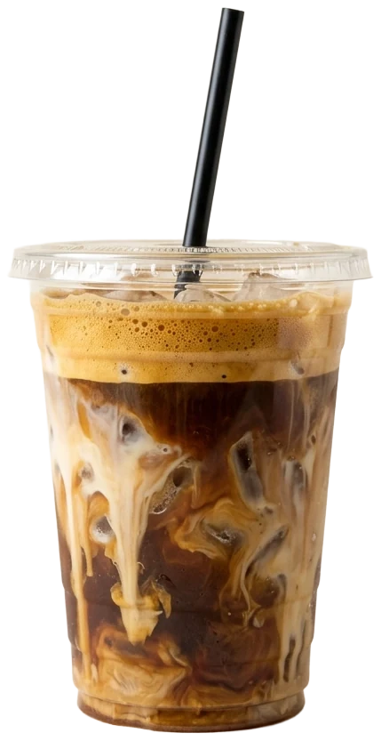 Espresso tonic in a clear cup, espresso cascading into tonic and ice