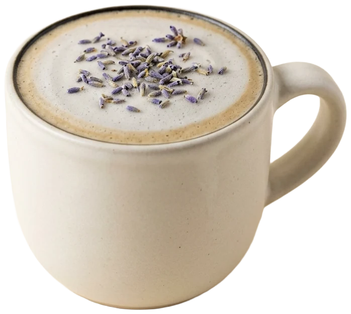 London fog in a warm-white mug, pale foam scattered with lavender buds